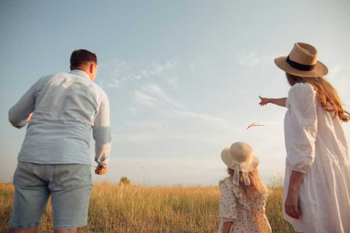 Family flying a kite